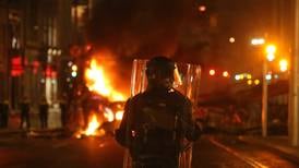 Dublin riots in pictures: Vehicles set on fire amid violent clashes with gardaí after stabbing 